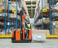 Forklift driver in warehouse