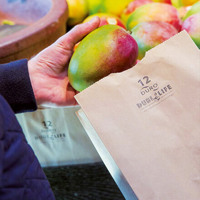 Mango in paper bag